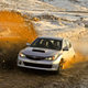 Illustration for article titled Subarus, Mud, And The Fine Art Of Sideways